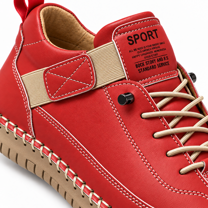 Mirabelle, zapatillas rojas con suela clara: detalle de la etiqueta y los pespuntes.